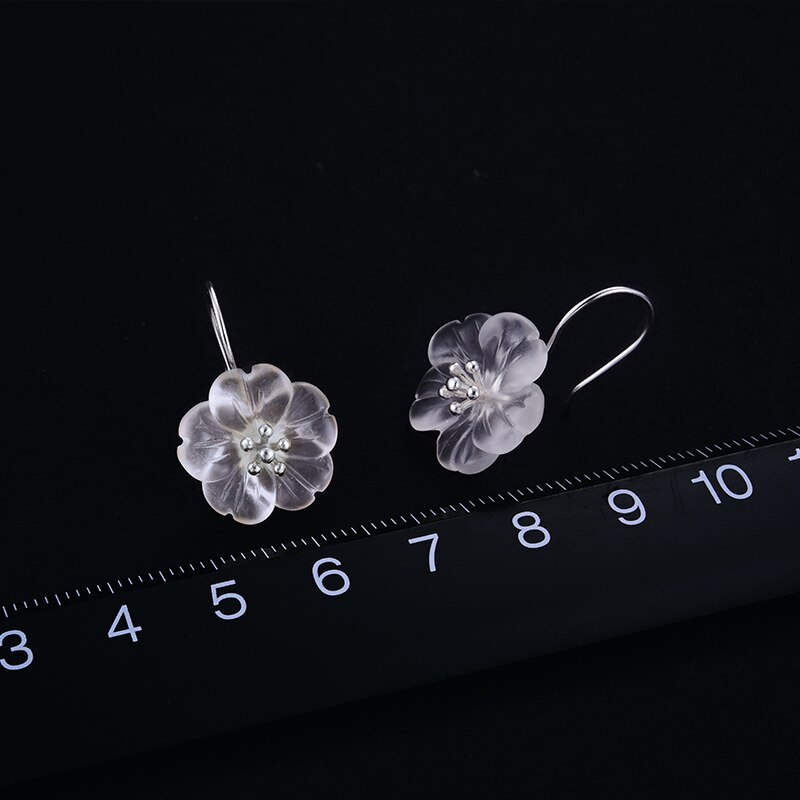 Boucles d’oreilles pendantes en argent 925 avec un motif en forme de fleur
